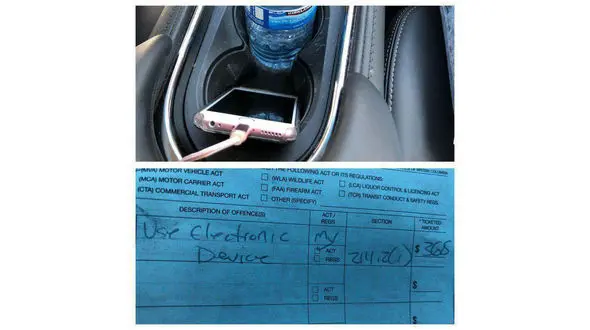 جریمه رانندگی به خاطر قرار دادن موبایل در محل لیوان آب خودرو