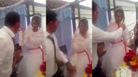 فیلم لحظه عمل زشت داماد هنگام کیک خوردن عروس در برابر میهمانان+ تصاویر
