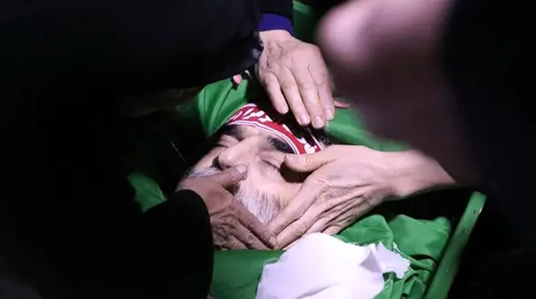 عکس های تلخ از وداع خانواده شهید فخری زاده با پیکرش