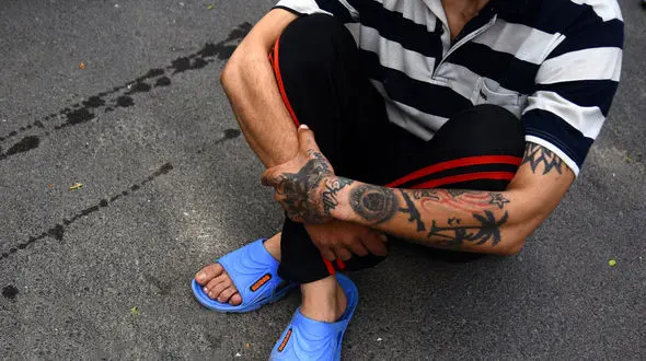 عکس های خالکوبی‌ های حیرت آور روی بدن مجرمان / از چه گوارا تا سیمپسون‌ها !