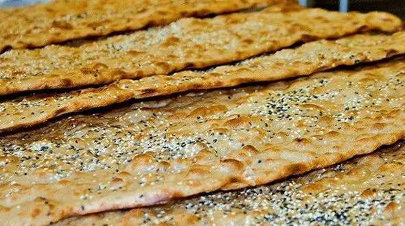 نان سنگگ ۵۰ هزار تومانی در برابر حقوق ۱۰ میلیونی /۱۵ درصد حقوق کارگر، خرج نان خالی با ویژگی خشخاشی!