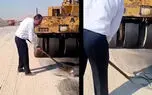 فیلم اقدام تحسین‌برانگیز پلیس راه کنگان / افسر وظیفه‌شناس با کندن آسفالت تقلبی مسافران را نجات داد