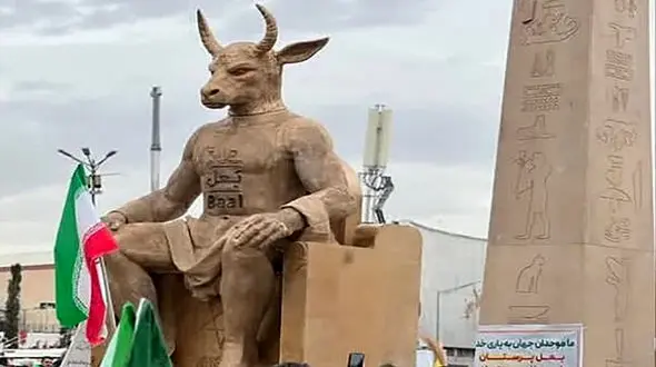 آتش کشیدن نماد بت بعل در مسیر راهپیمایی 22 بهمن