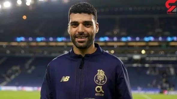 مهدی طارمی با پرچم مقدس ایران در جشن قهرمانی پورتو + عکس