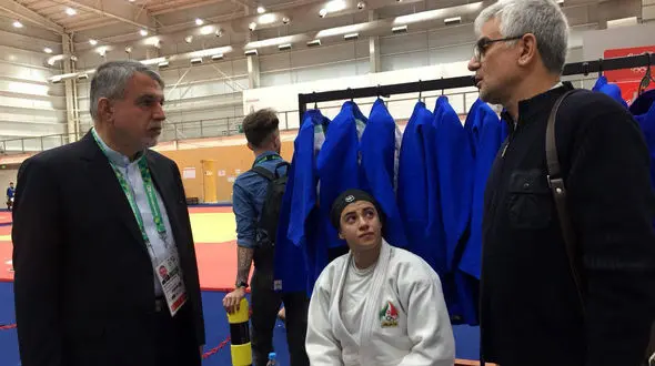 دختر جودوکار ایران به خاطر حجاب از مبارزه محروم شد + عکس