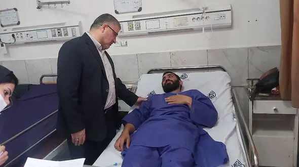 عیادت رئیس سازمان پزشکی قانونی از مجروحان حمله تروریستی به زندان اوین