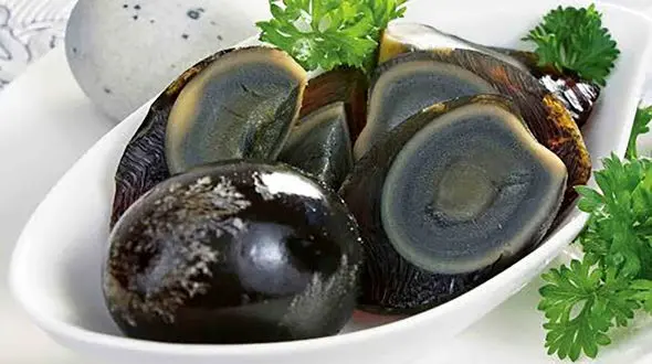  پختن غذا‌ با گوشت مار پیتون+عکس 