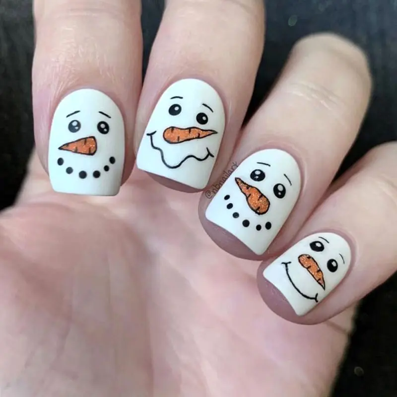 دیزاین ناخن کیوت زمستانی آدم برفی