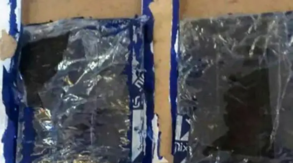 حمل تریاک با جاسازی در قاب صنایع دستی در پست ارومیه + عکس 