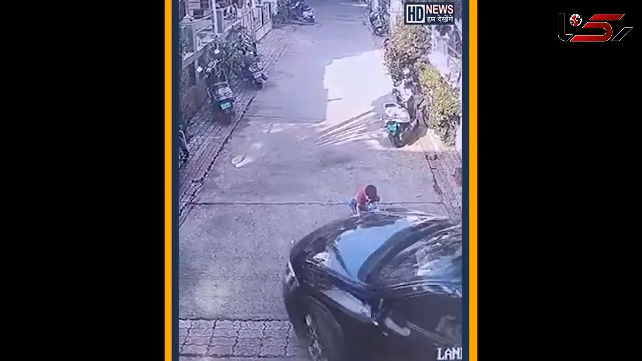 فیلم / رد شدن ماشین از روی کودک خردسال