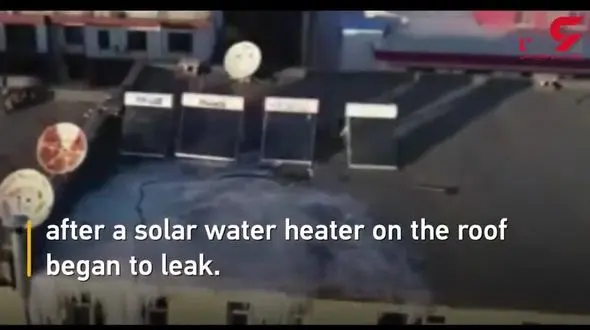 صحنه ای عجیب از نشتی آبگرمکن خورشیدی در روی یک ساختمان+فیلم