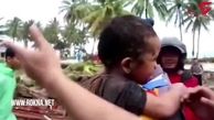 نجات معجزه آسای یک کودک از زیر آوار + فیلم