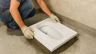 خلاقیت خنده دار پدر ایرانی با طراحی و ساخت توالت در راه پله خانه اش حماسه آفرید / هنر نزد ایرانیان است و بس