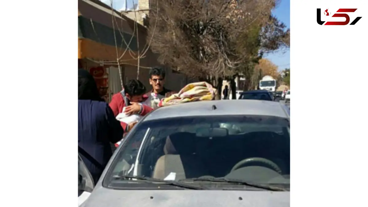 نجات از مرگ کودک 2 ساله از خودروی داغ و بدون اکسیژن / افسر پلیس اتفاقی فرشته نجات کودک شد