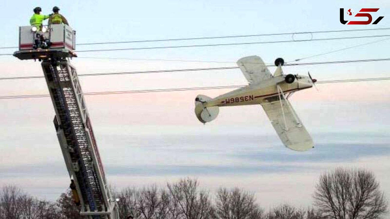 عکسی عجیب از گیر افتادن هواپیما در کابل های برق 