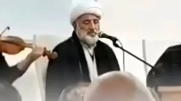 فیلم / مات و مبهوت شدن از آواز جگرسوز یک روحانی با ساز  ویولن ! / چه صدای پر قدرتی !