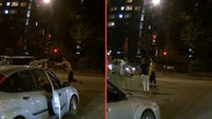 فیلم لحظه درگیری مرد مهاجم با یک زوج جوان در خیابان / مرد مزاحم کتک خورد + تصاویر
