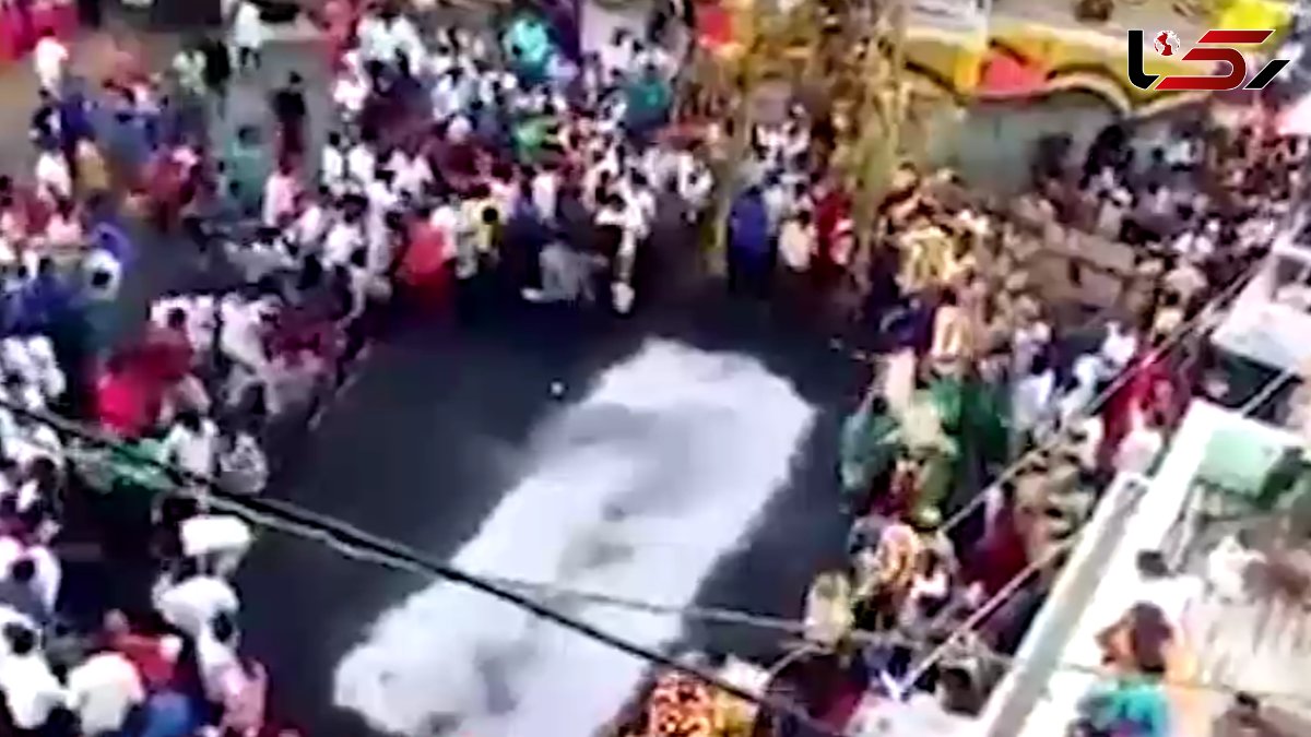 این زن روی ذغال گداخته راه رفت تا!! + فیلم