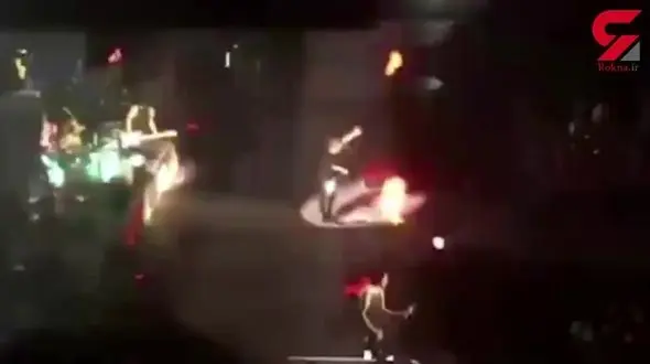 سر یک گیتاریست معروف در کنسرت زنده آتش گرفت! + فیلم لحظه حادثه و عکس