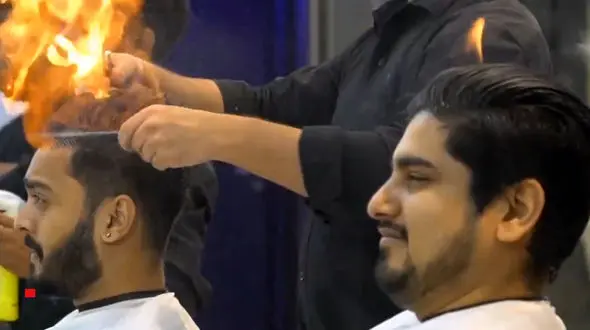 اصلاح موی سر داماد با آتش ! + فیلم و عکس