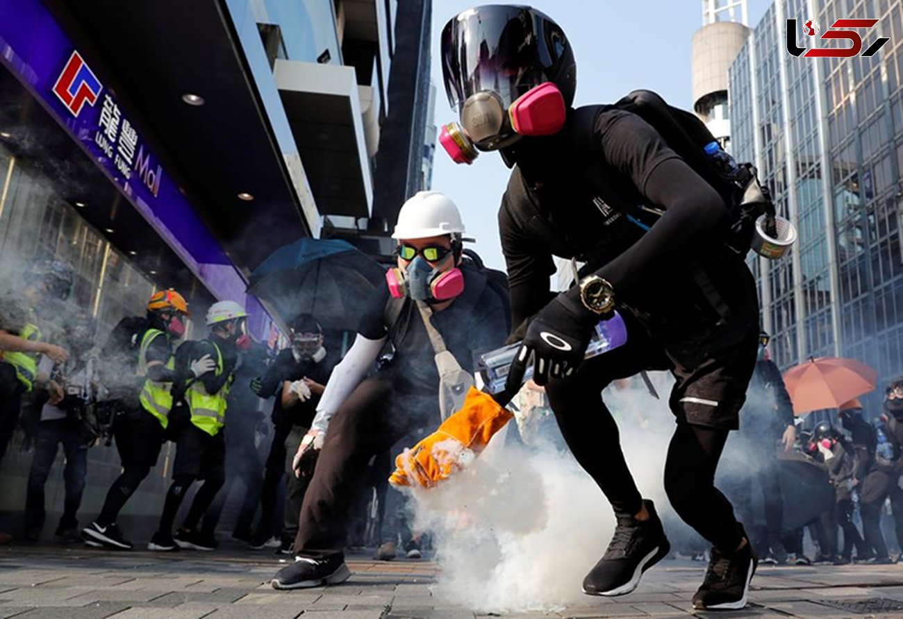 معترضان به وزیر دادگستری هنگ‌کنگ در لندن حمله کردند