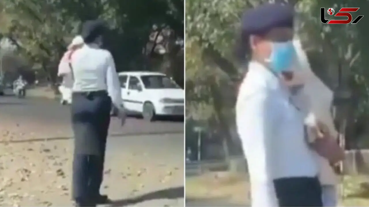 انجام وظیفه پلیس رانندگی با نوزاد در آغوش!