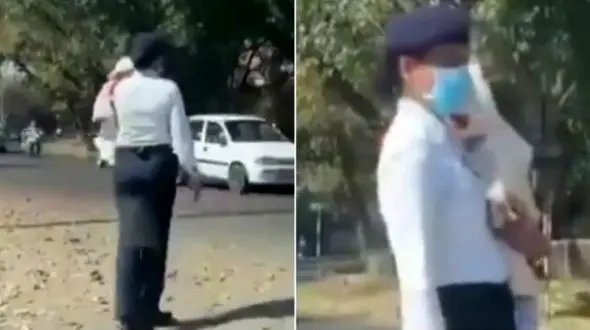 انجام وظیفه پلیس رانندگی با نوزاد در آغوش!