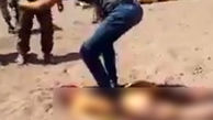 رفتار وحشیانه گروه های تروریستی سوریه با جسد خلبان هلیکوپتر روسی +تصاویر (14+)
