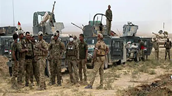 مادر عراقی ، پسر داعشی خود را تحویل پلیس داد 