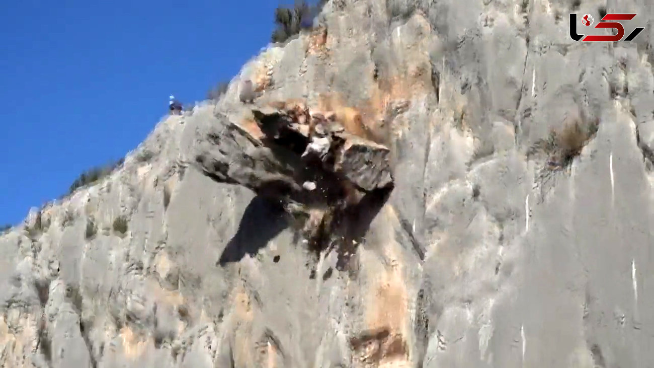 ریزش کوه زیر دست های یک کوهنورد خوش شانس + فیلم بسیار جالب