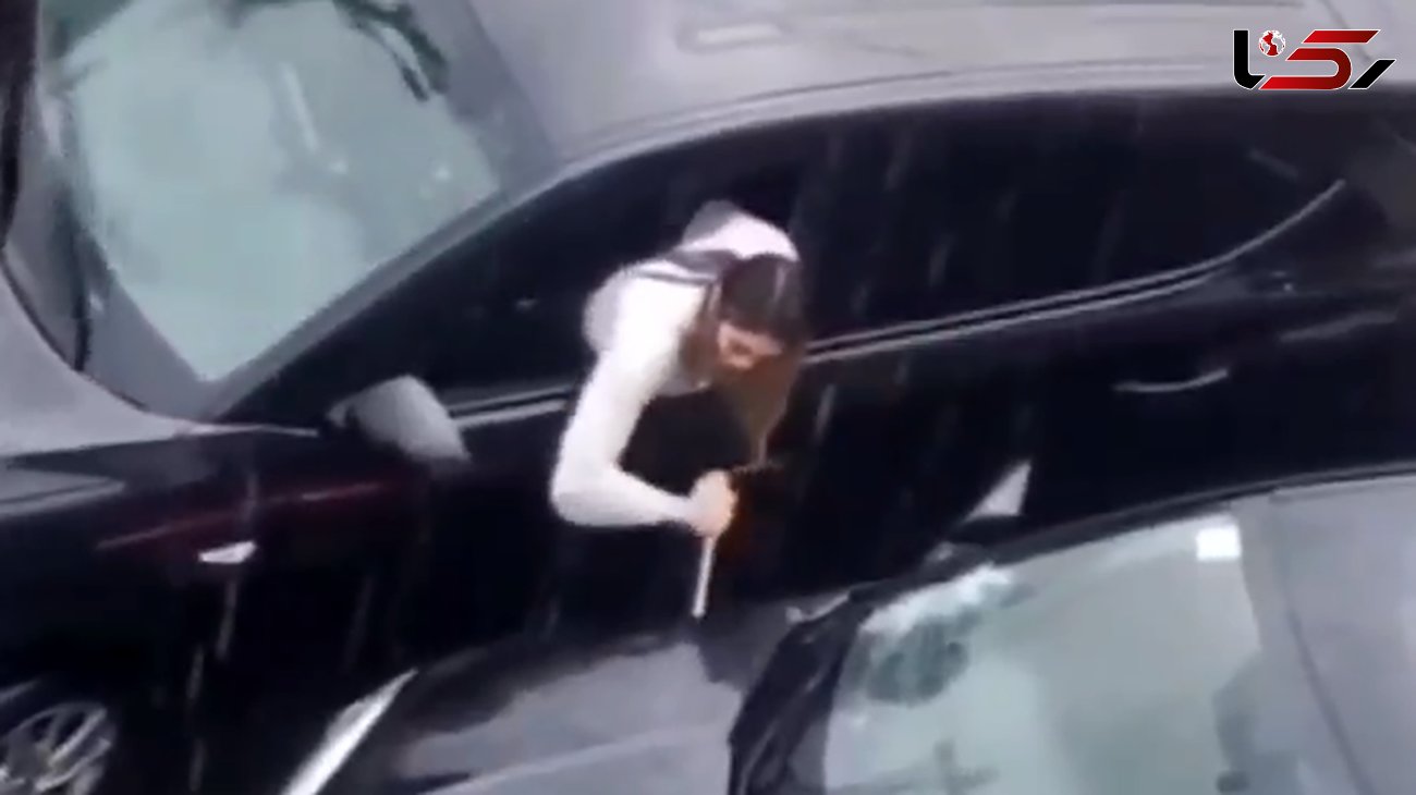 فیلم حمله زن عصبانی به ماشین شوهرش ! / پای زن دومی در کار است !