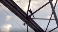 فیلم لحظه سقوط مرد عنکبوتی اهواز از پل آهنی معروف + عکس
