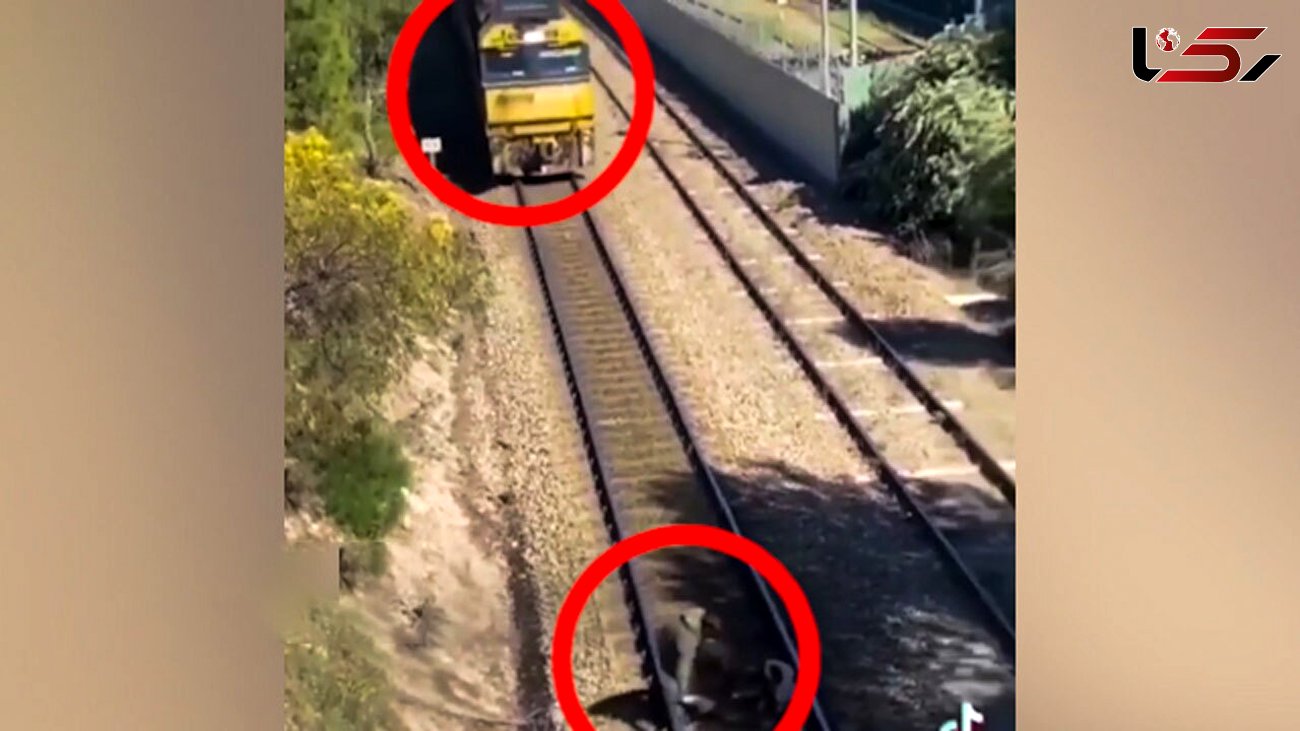 فیلم فداکاری یک مرد برای نجات سگ از له شدن زیر قطار !