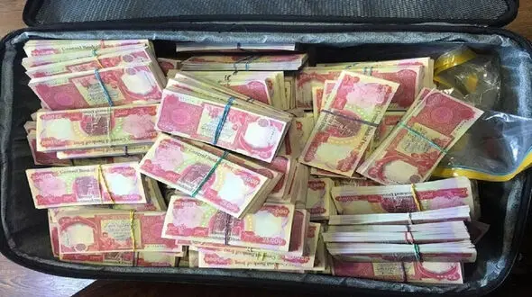 کشف قاچاق دینار عراقی در قم
