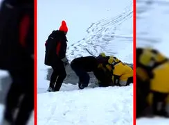 فیلم نجات گوزن گرفتار در یخ زده دریاچه