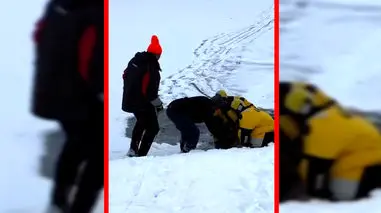فیلم نجات گوزن گرفتار در یخ زده دریاچه