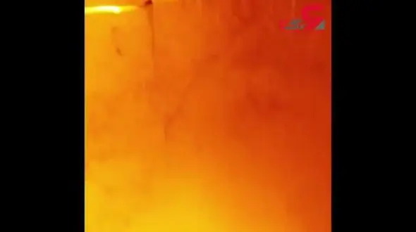 عبور  مرد جوان از داخل آتش  با خودرو شخصی+فیلم