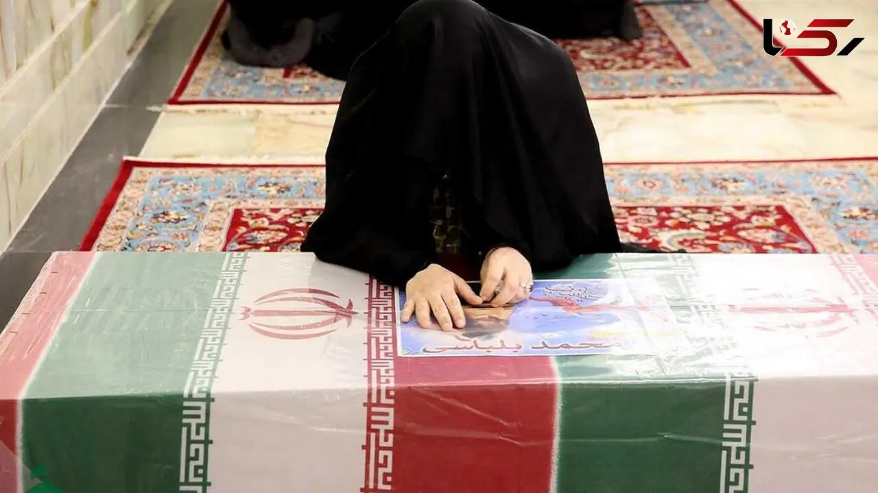 نوشته پر احساس همسر شهید بلباسی بر تابوت همسرش + عکس