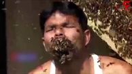 این مرد هندی زنبورهای زنده را دولپی می خورد!+ فیلم