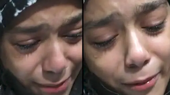 فیلم ضجه های دختر شهید مدافع حرم پس از 6 سال دوری از پیکر پدر 