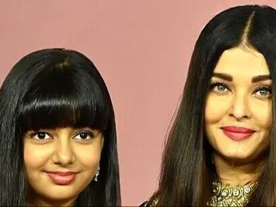 جشن تولد ساده و خودمونی دختر آیشواریا، چهره محبوب هند/تزئین زیبای کیک شکلاتی با فندق و خلال بادوم