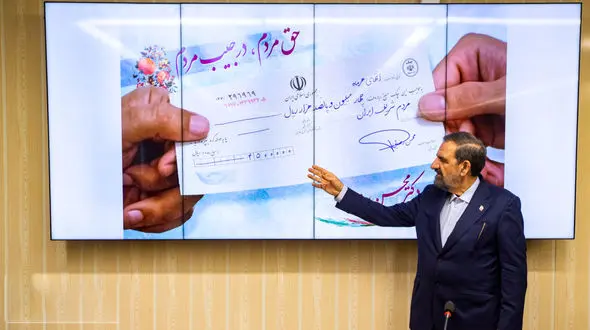 رونمایی محسن رضایی از چک یارانه 450 هزار تومانی+ویدیو