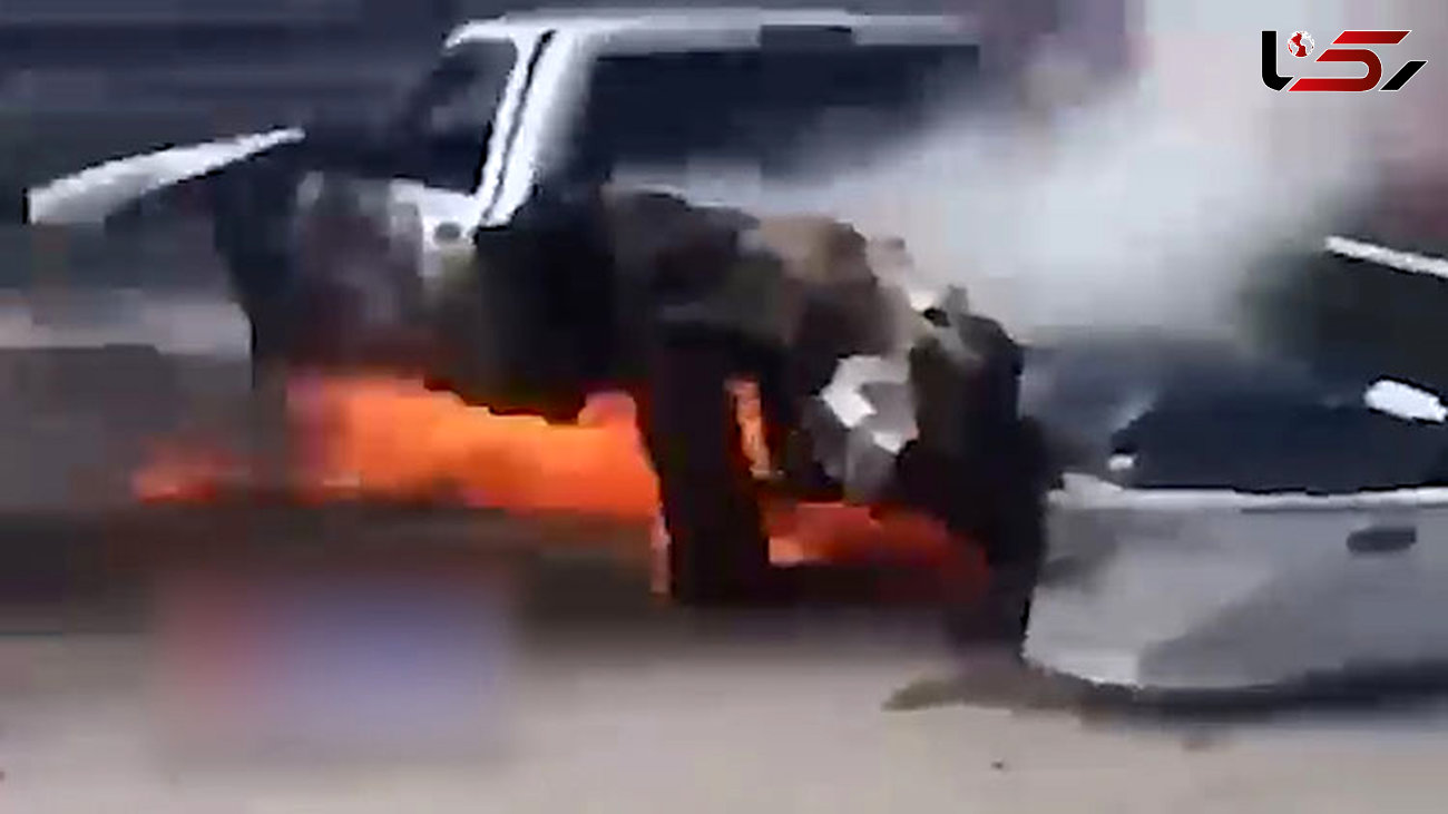فیلم / نجات راننده گرفتار از داخل ماشین در آتش / راننده های عبوری در بزرگراه فداکاری کردند / امریکا