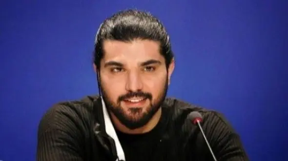 قاب خانوادگی سینا مهراد در یک مراسم هنری