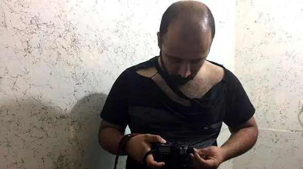 حمله  شهرداریچی ها به یک عکاس خبرنگار + تصویر