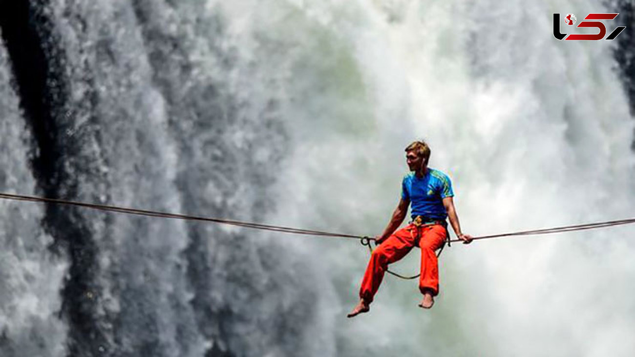 عبور بندباز حرفه ای از یکی از بلندترین آبشارهای جهان+ تصاویر 