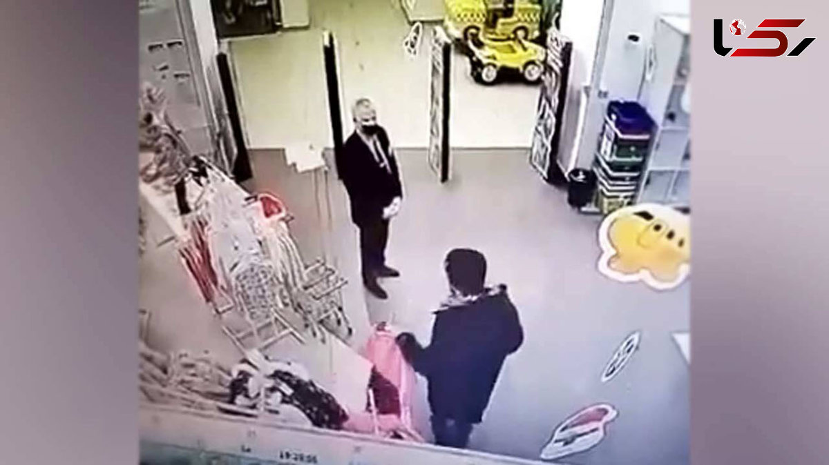 فیلم درگیری سارق خونسرد با نگهبان مغازه لباس بچه + عکس