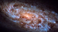 کهکشان مارپیچی ستاره فشان + عکس