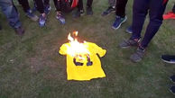 لحظه به آتش کشیدن پیراهن تیم نفت توسط یک مدیر فوتبالی+ فیلم