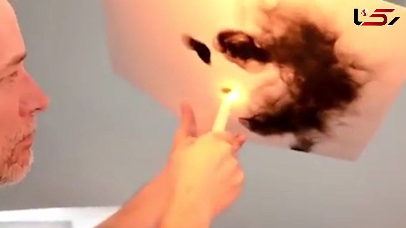 هنرمندی که با دود آتش نقاشی می کشد +فیلم